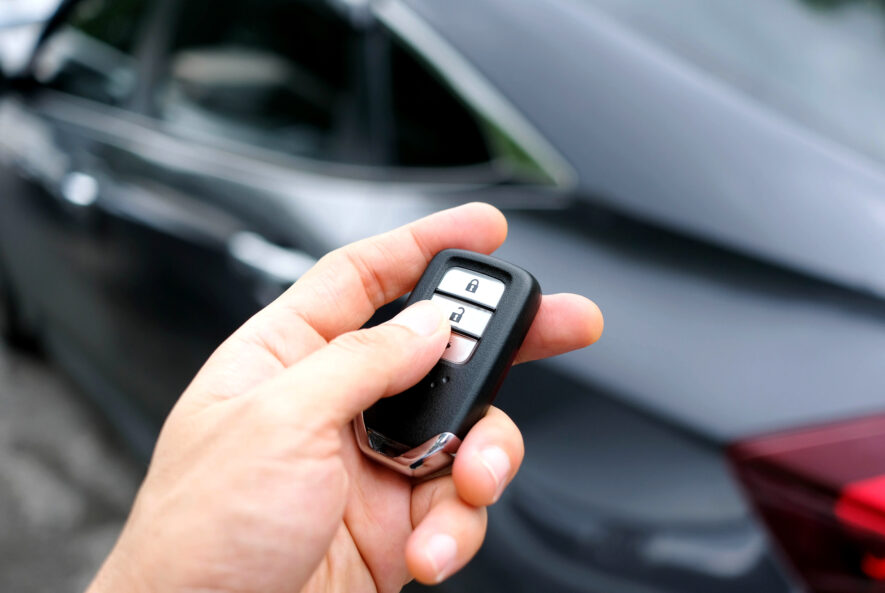 Professional locksmith repairing a car lock